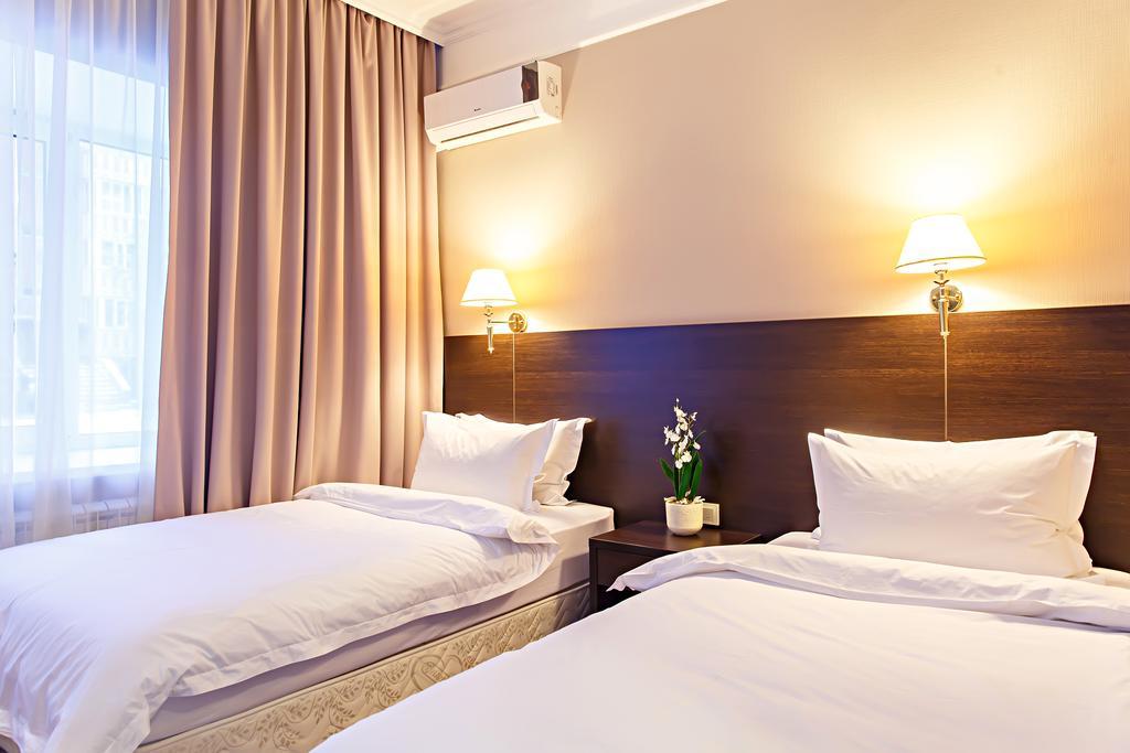 Red Village Hotel Astana Bagian luar foto