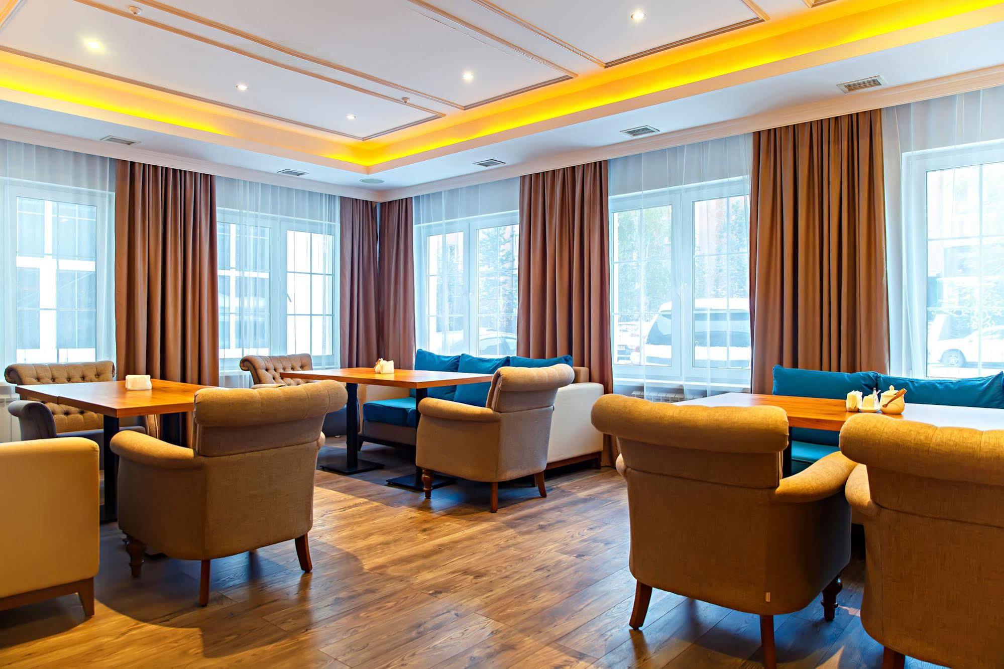 Red Village Hotel Astana Bagian luar foto